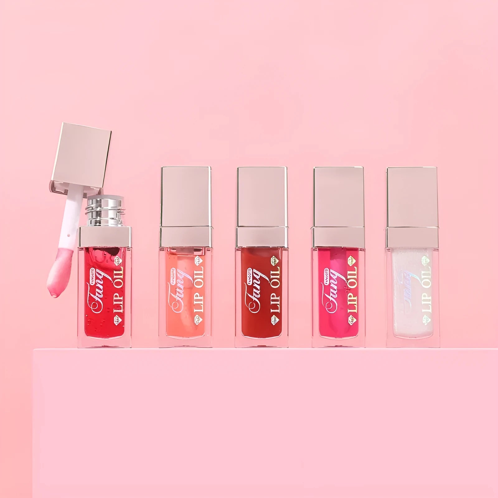 Five bright colour lip gloss lipstick tubes with moisturising essence oil including mint shade