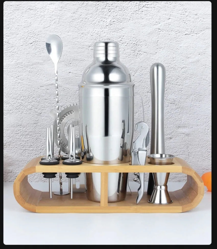 23-piece stainless steel and acrylic European style cocktail set on a bar