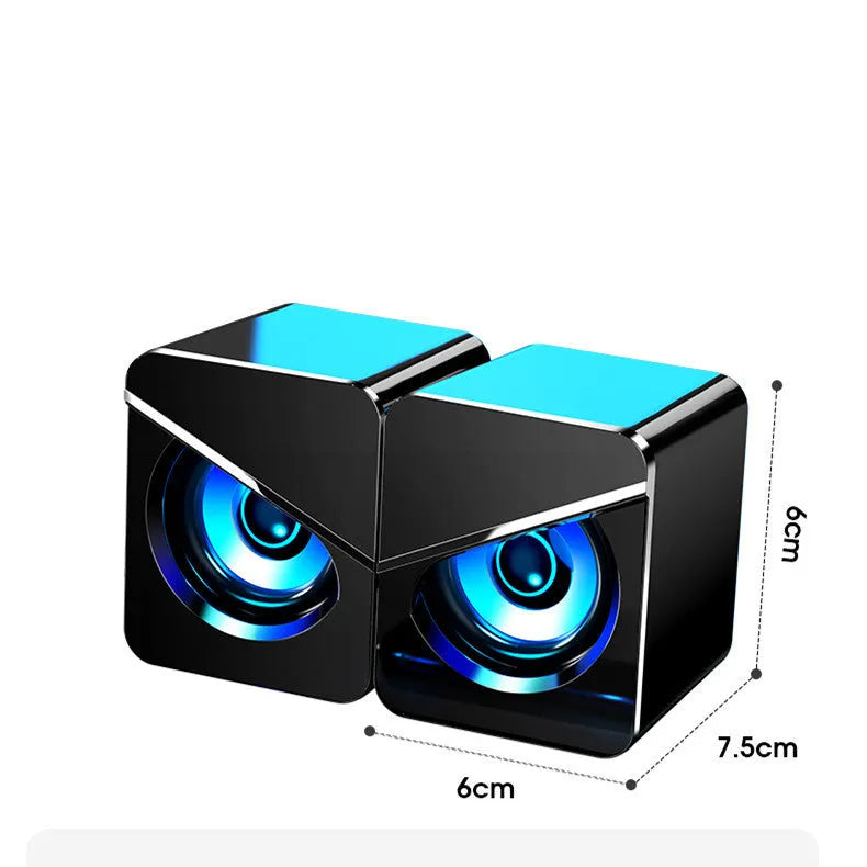 Black USB mini desktop speakers with independent volume knob and wired connection for computer audio