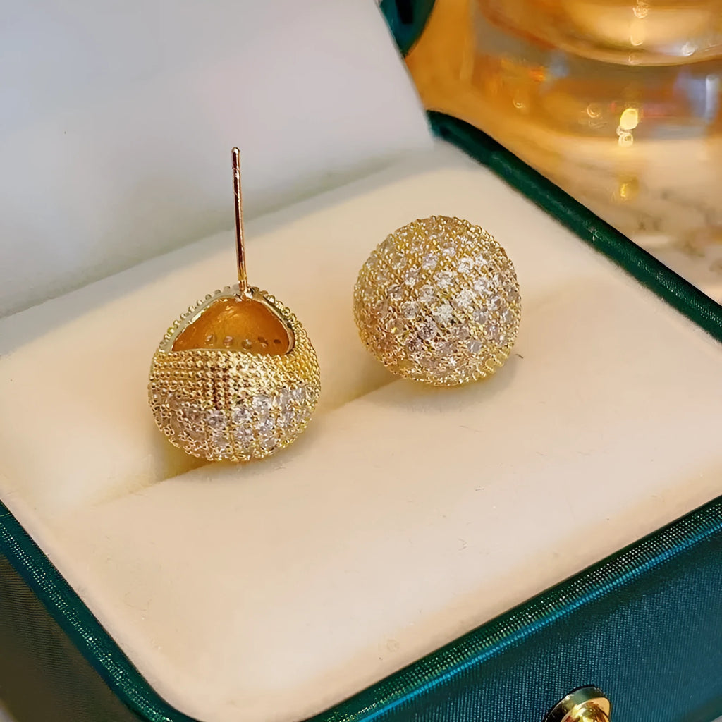 Geometric drop-shaped golden beans and diamond ear clips in gold and white colour options