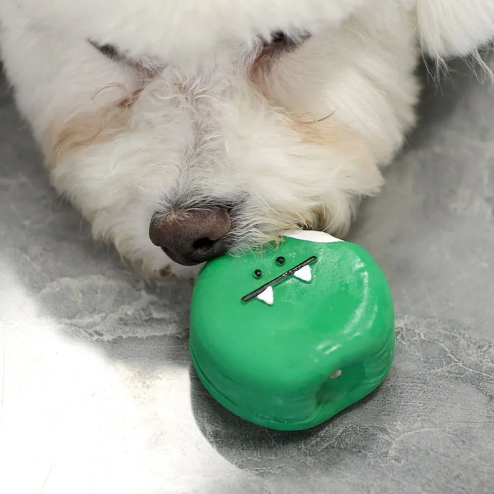 Yellow and green cartoon bread egg shaped latex squeaky toy for dogs on a white background.