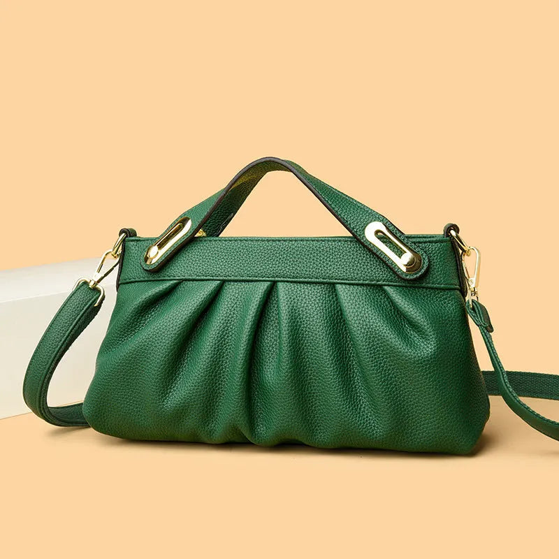 Genuine leather crossbody bag with pleated shoulder strap, horizontal square shape, available in six colours including black, khaki, green, beige, blue, red