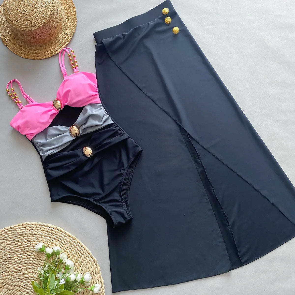 Women's brown one-piece swimsuit with matching beige skirt for swimming and water activities