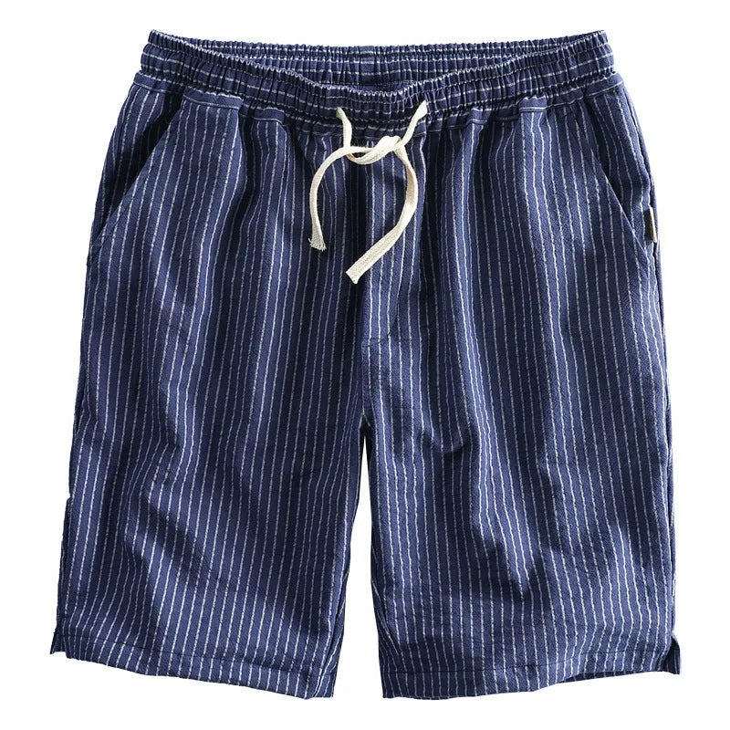 Men's striped cotton casual shorts in a loose straight-leg fit on a mid-waist.