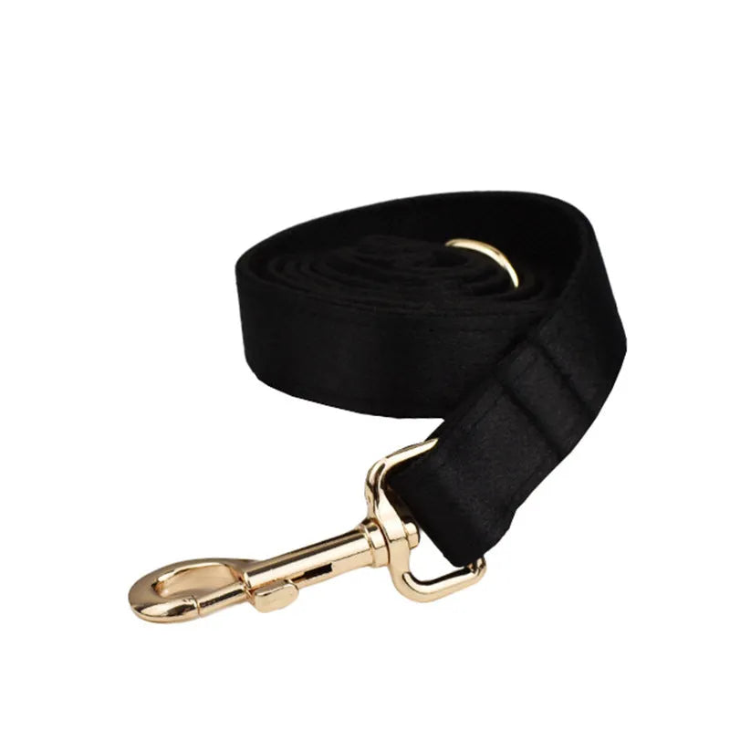Dog harness and leash set with adjustable chest strap, matching bow, and vest accessories in fabric construction