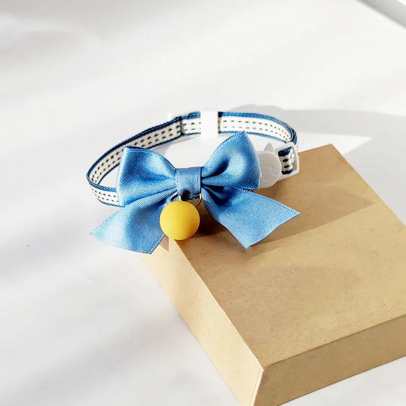 Cute cat bow tie collar with bell in eight colours – orange, pink, purple, navy blue, powder blue, yellow, green – adjustable size