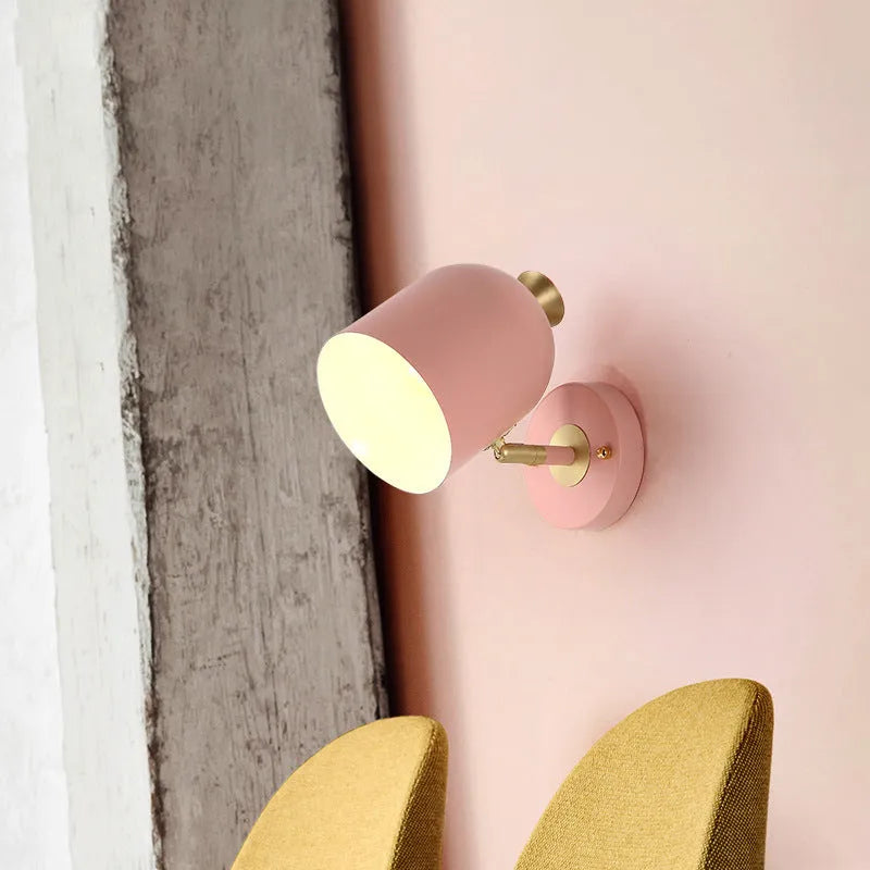 Single-head aluminium bedside wall lamp in a choice of yellow, green, blue, or pink colours.
