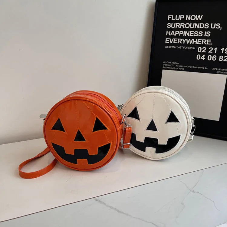 Small round pumpkin-shaped PU shoulder bag in orange for Halloween
