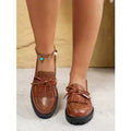 Women's black and brown loafers with bow detail, synthetic PU upper, available sizes 36-43