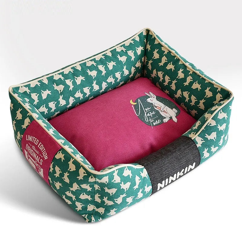 Jarre Aero Bull dog bed in a rabbit colour option shown on a floor
