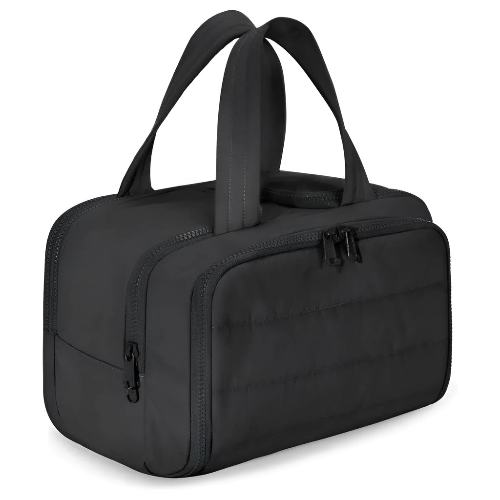 Large lightweight travel wash bag in pink with a wide-open zipper showing a fluffy interior lining.