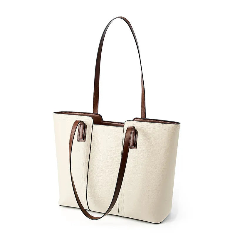 Women's black genuine leather commuter bag with multiple internal compartments in horizontal square shape