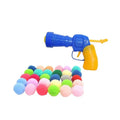 Pet toy launcher gun with soft plush balls for fetch games.