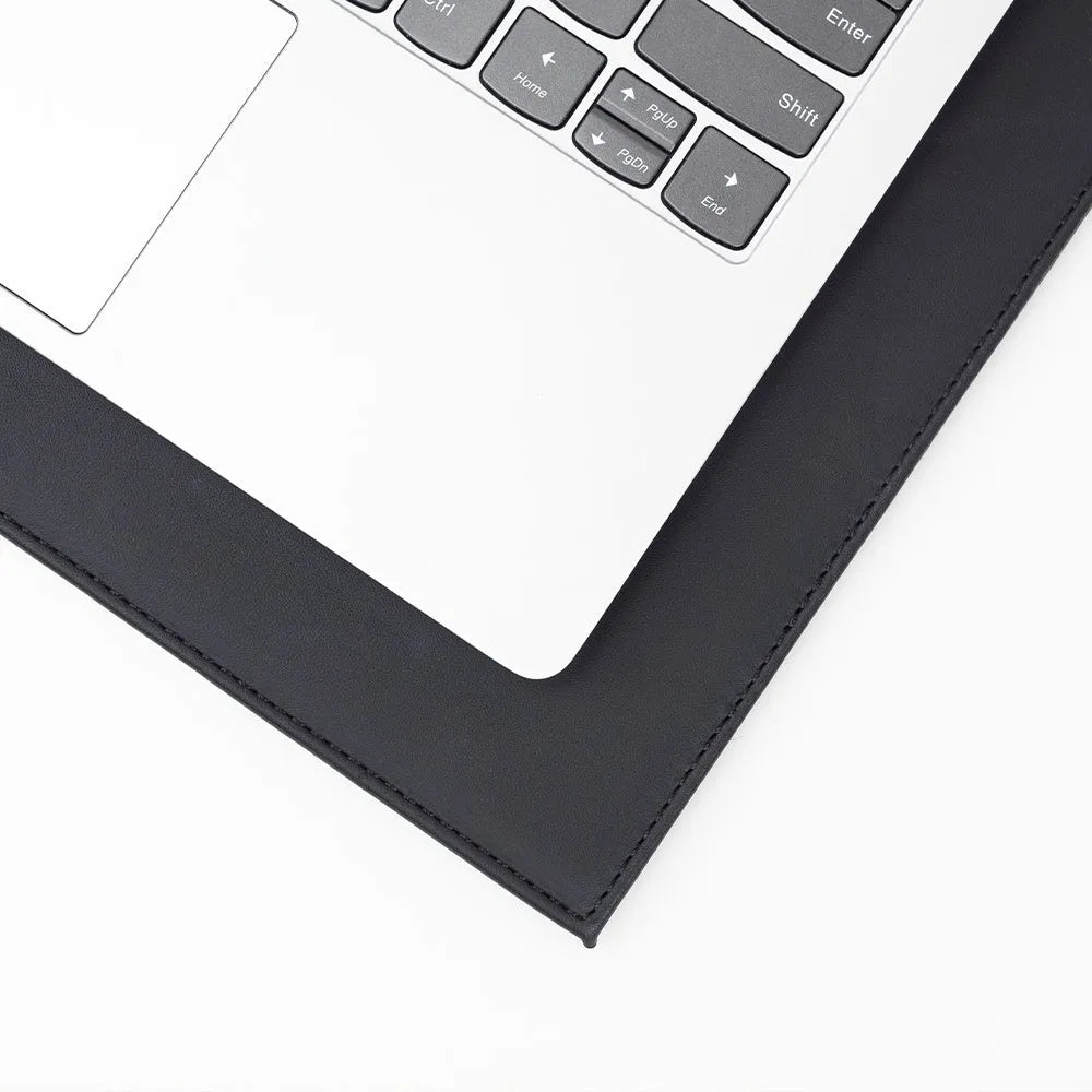 A3 sized anti-radiation printing pad in blue colour on a desk next to a printer.