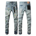 Black slim fit straight leg men's jeans with a button fly on a mannequin.