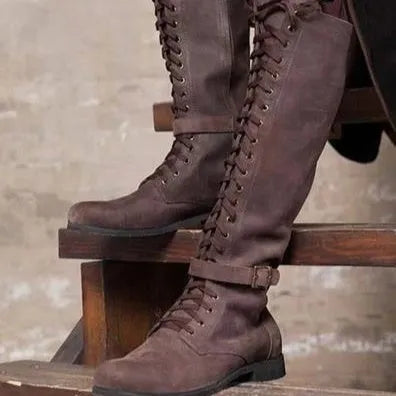 Women's long lace-up boots with low heel in black artificial PU and rubber sole
