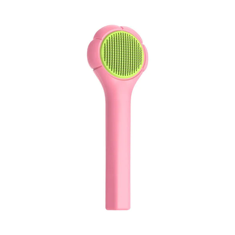 Floating needle comb for cats and dogs in green colour with ABS handle and steel teeth