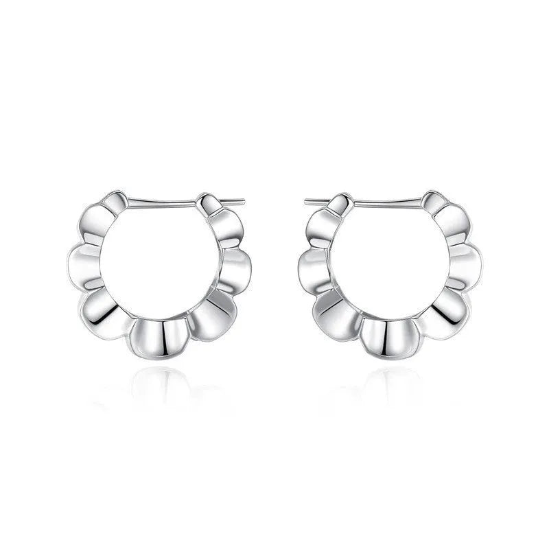 Pair of sterling silver geometric earrings with round design elements and electroplated finish