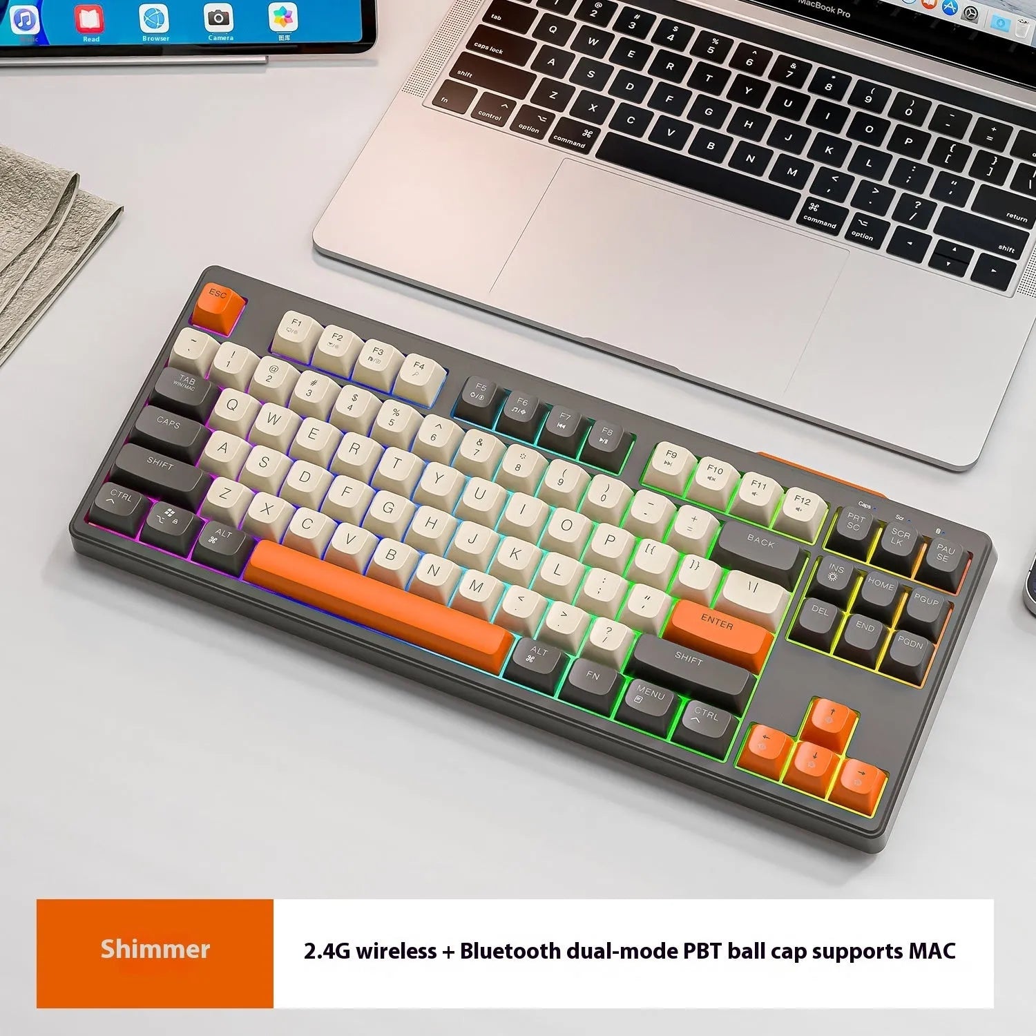 Wolf M87 wireless Bluetooth dual-mode mechanical keyboard in blueberry colour on a wooden desk.