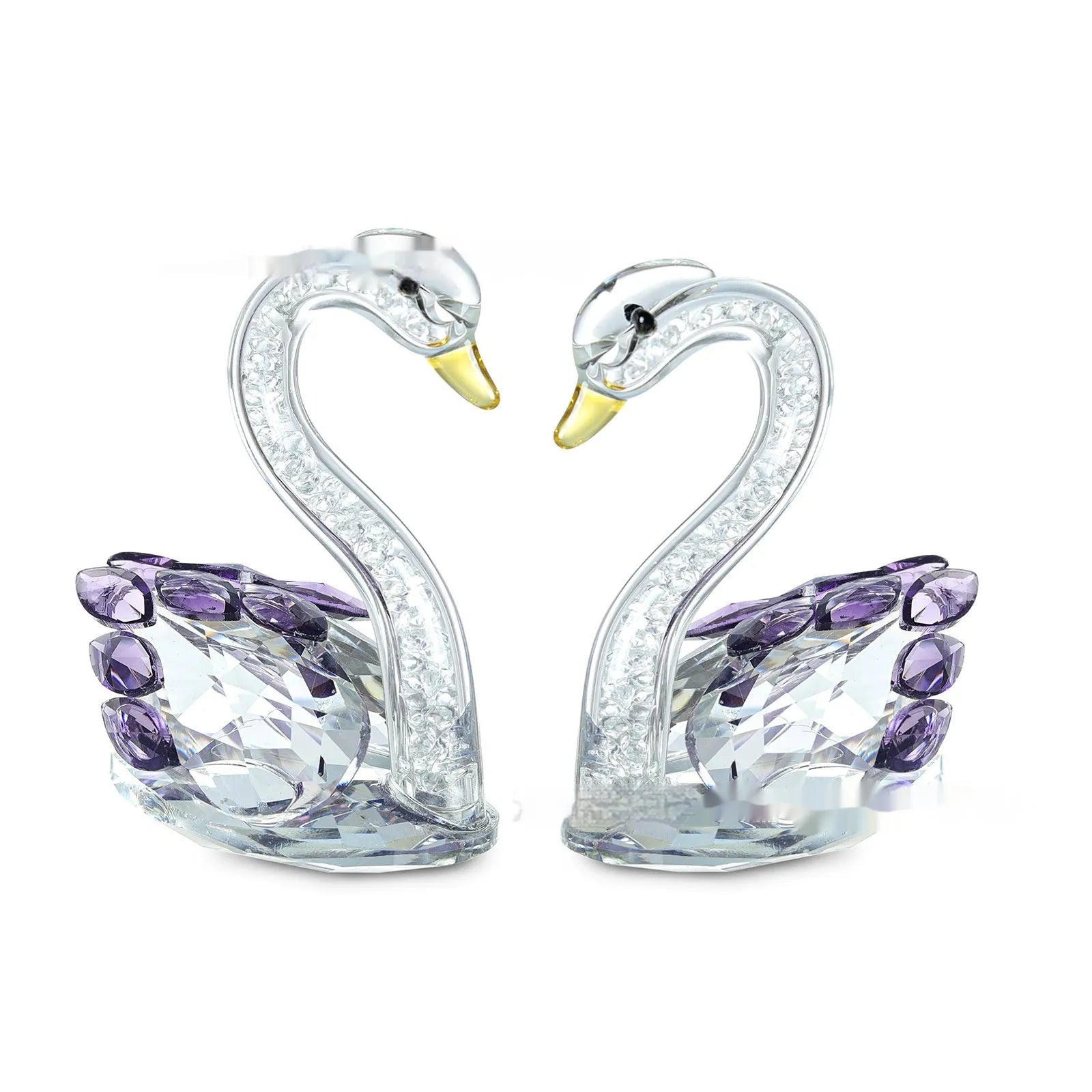 Modern white crystal swan decoration on a desk, available in red, blue, pink, and purple.