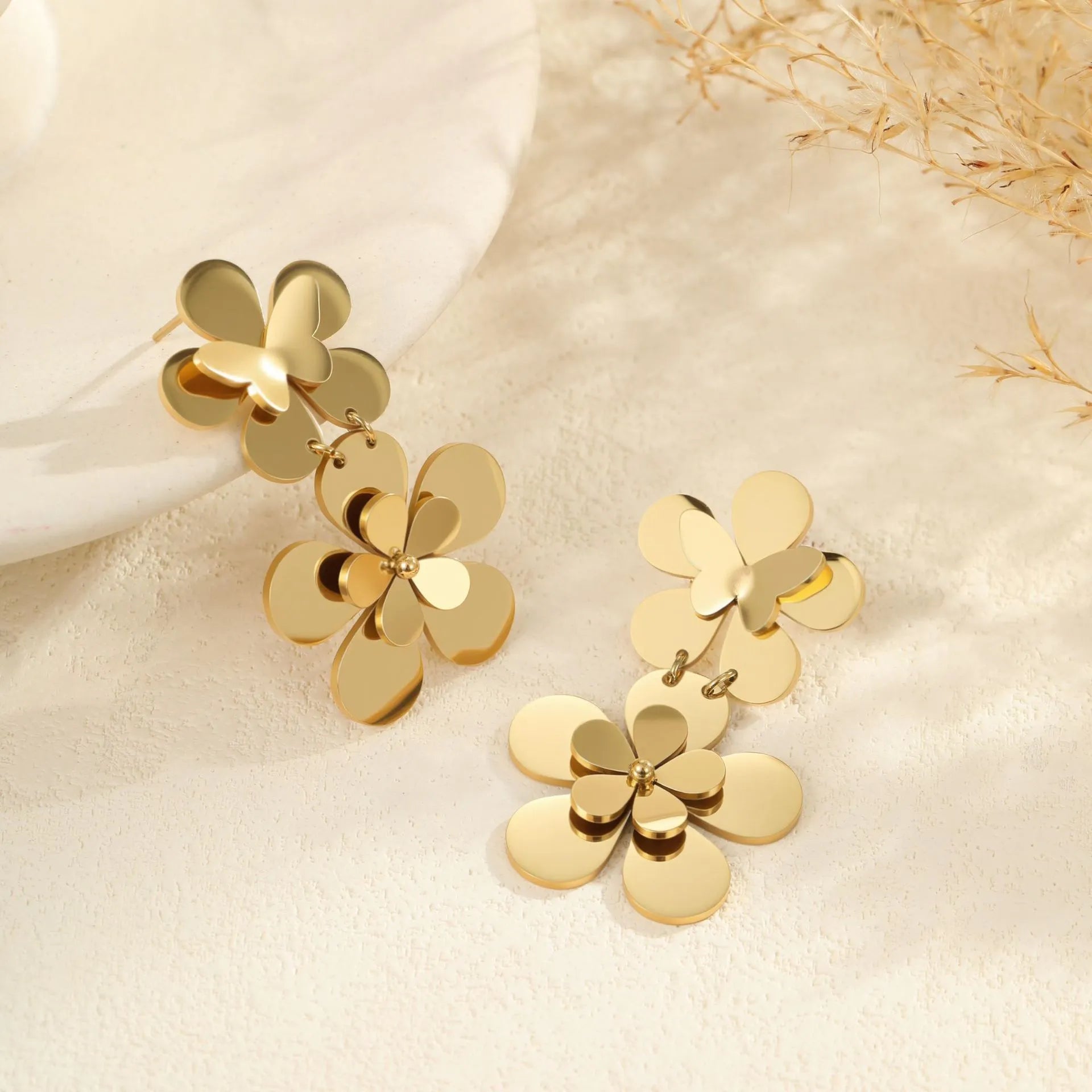 Gold electroplated stainless steel earrings with floral butterfly design for women