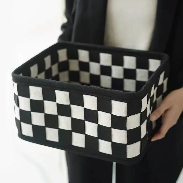 Checkerboard woven felt storage basket showing folding design and 37x29x19.5cm dimensions