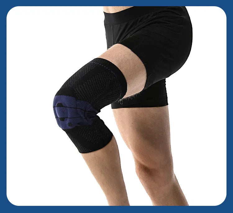 Adult sports knee pad in black and blue colour, shown on a knee for running and basketball protection.