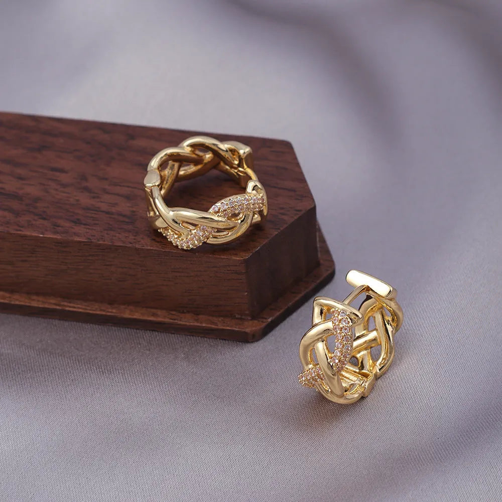 Pair of micro zircon-encrusted woven twisted stud earrings in gold real gold plating finish
