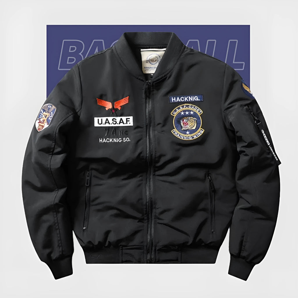 Man wearing a slim-fit black retro motorcycle jacket with stand collar and embroidery details.