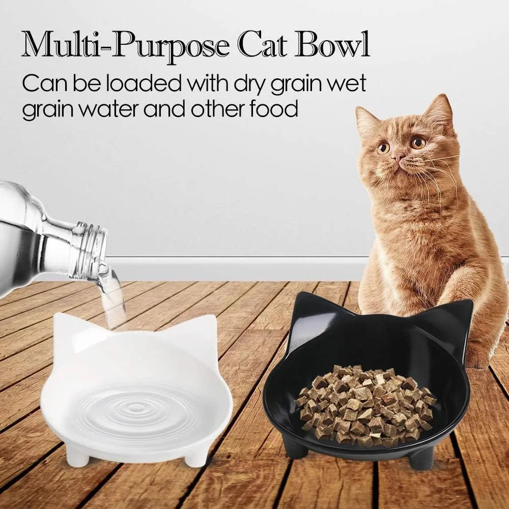 Shallow white melamine cat bowl with non-slip rubber base on a floor