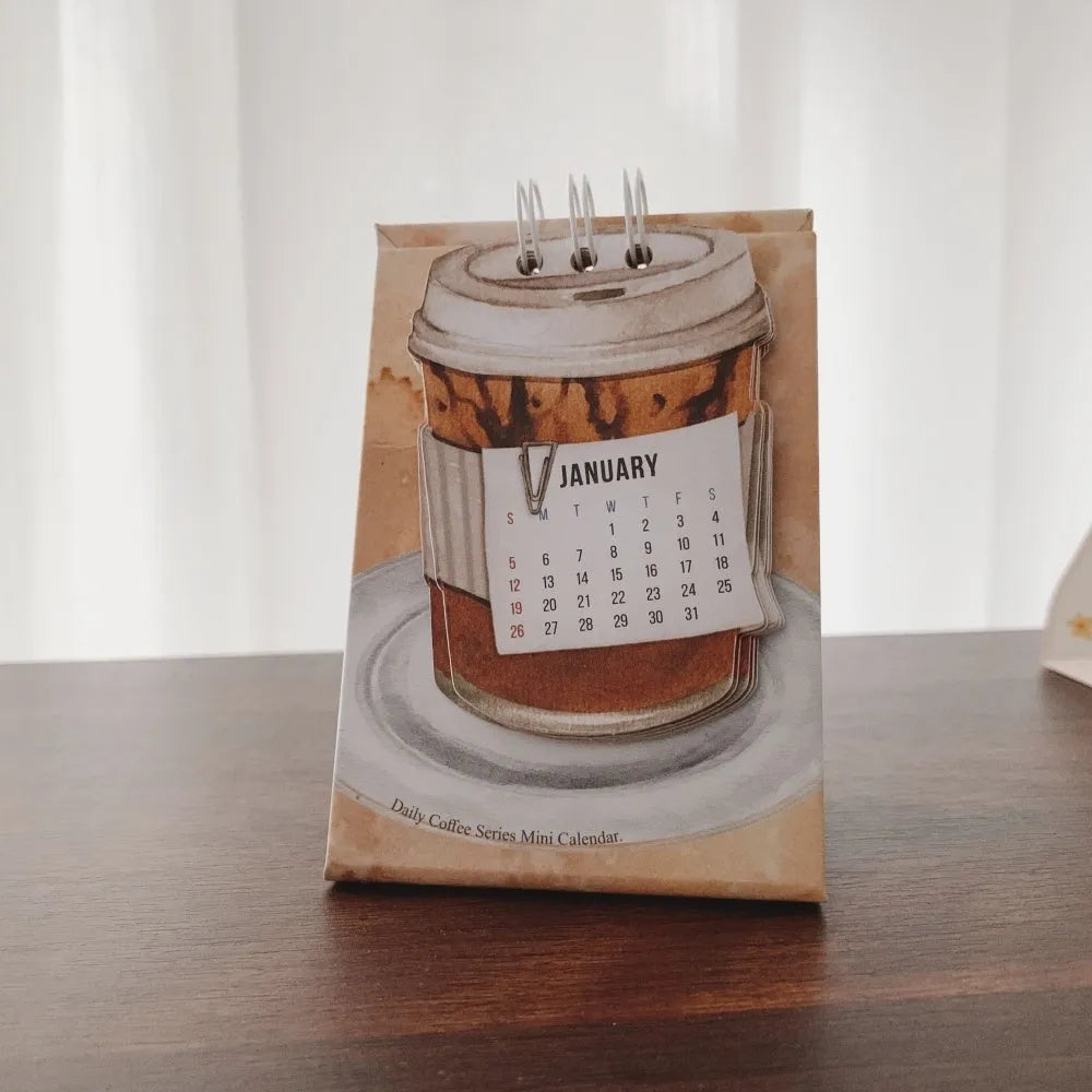 Mini 2025 desk calendar showing coffee theme with motivational design
