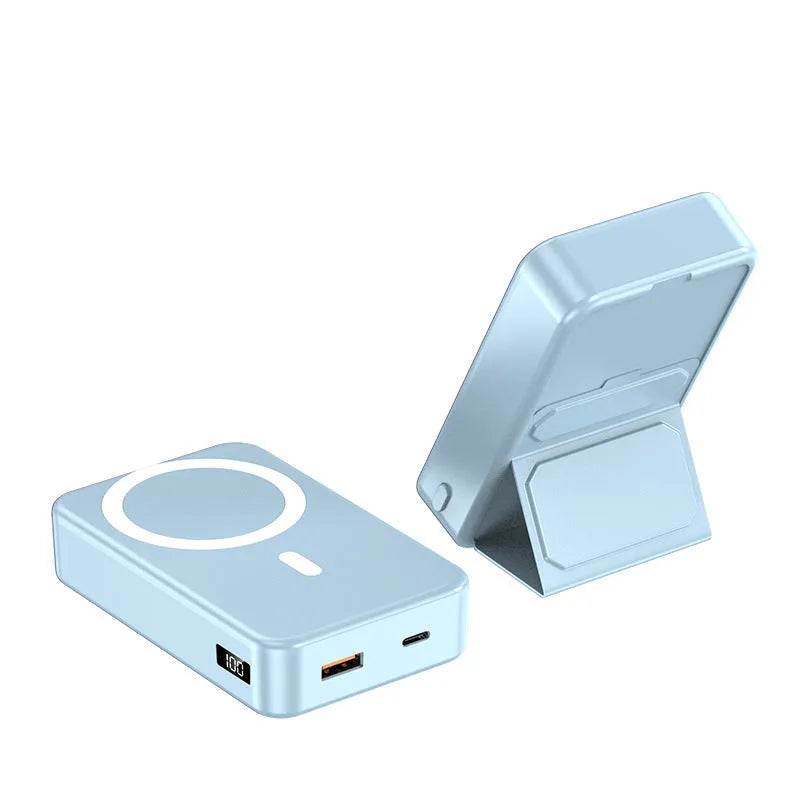 Magnetic wireless charging power bank with folding stand unfolded, shown in navy blue colour.