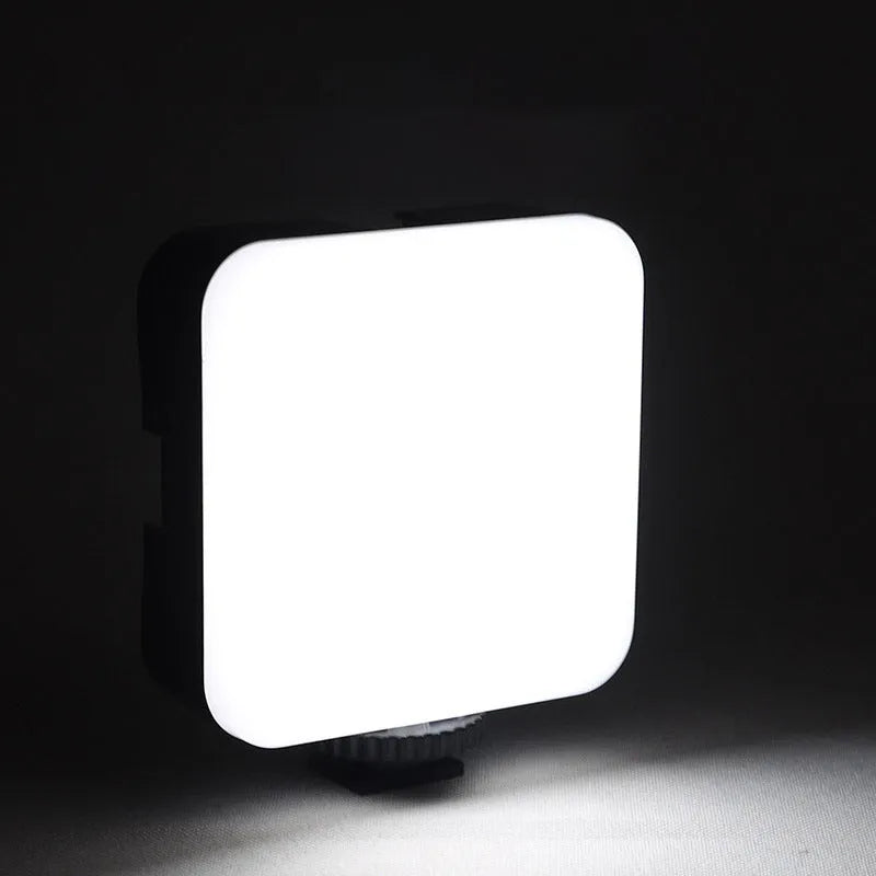 LED mini square outdoor pocket light tripod with rotatable flash head showing 7.3cm compact dimensions