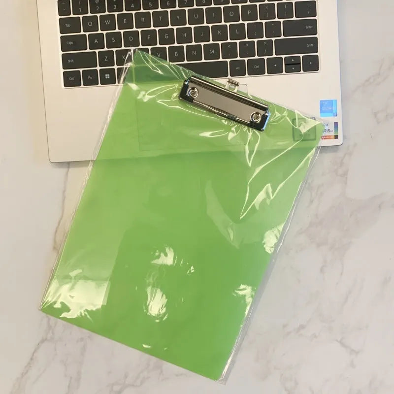 A4 transparent writing board pad with metal clip showing document display and writing surface