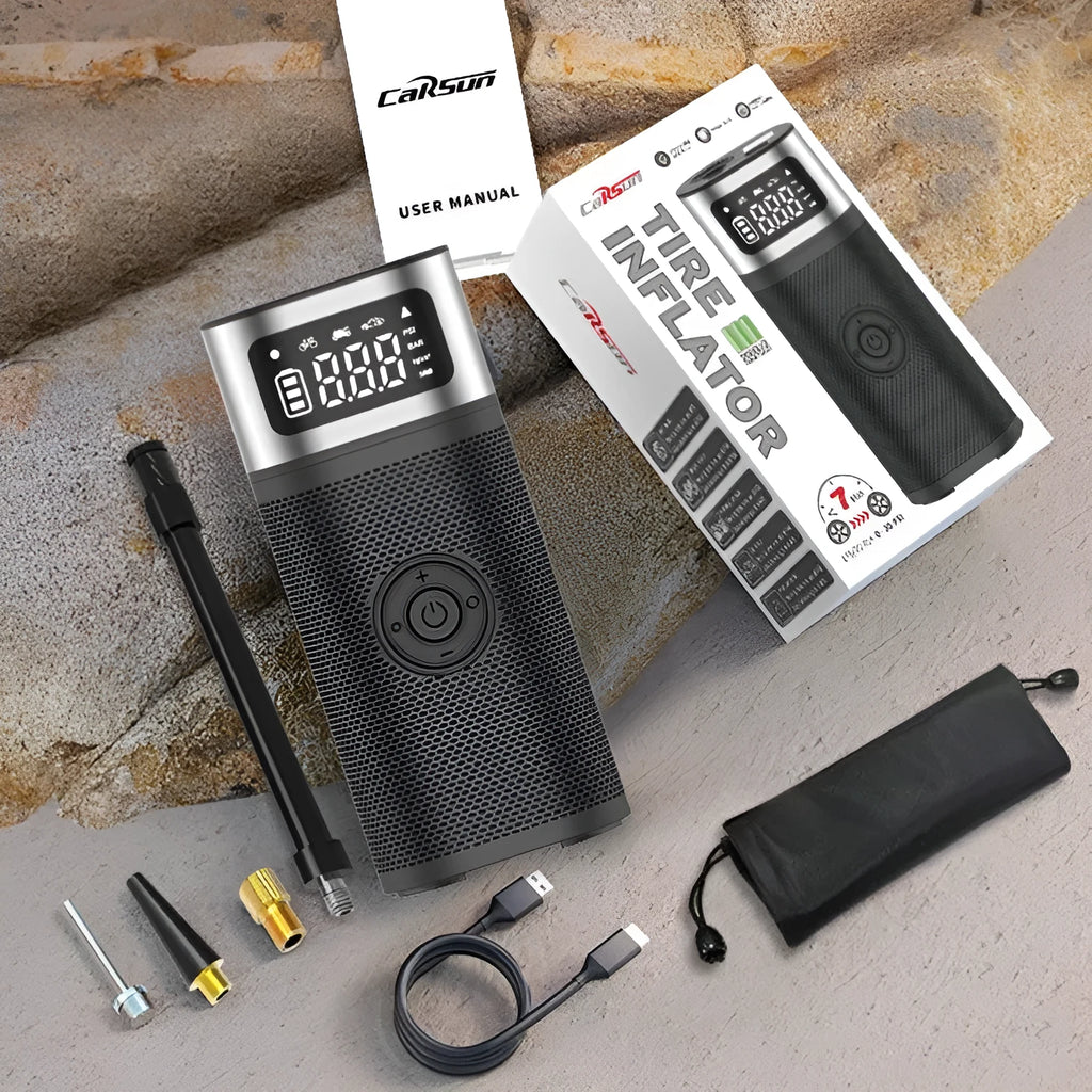 Black portable wireless air pump with USB cable and accessory nozzles for vehicles and sports equipment