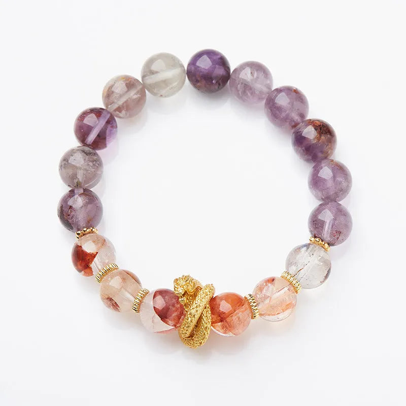Purple ghost crystal bracelet with nine purple symbols and zodiac animal motifs measuring 10mm wide