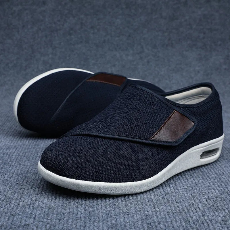 Beige leisure shoes with a Velcro strap closure and a round toe.