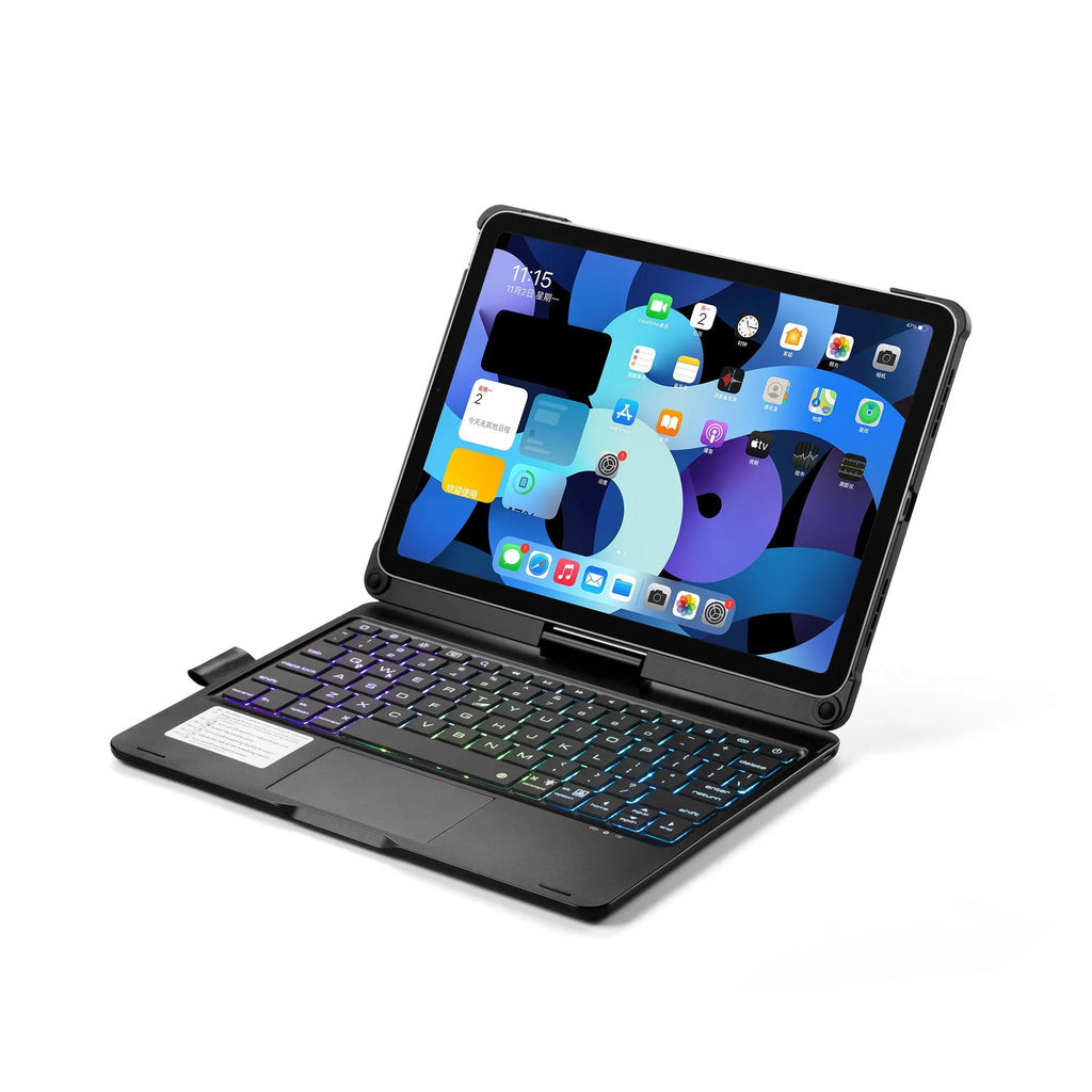 Rotating Bluetooth keyboard with backlit keys next to an iPad tablet