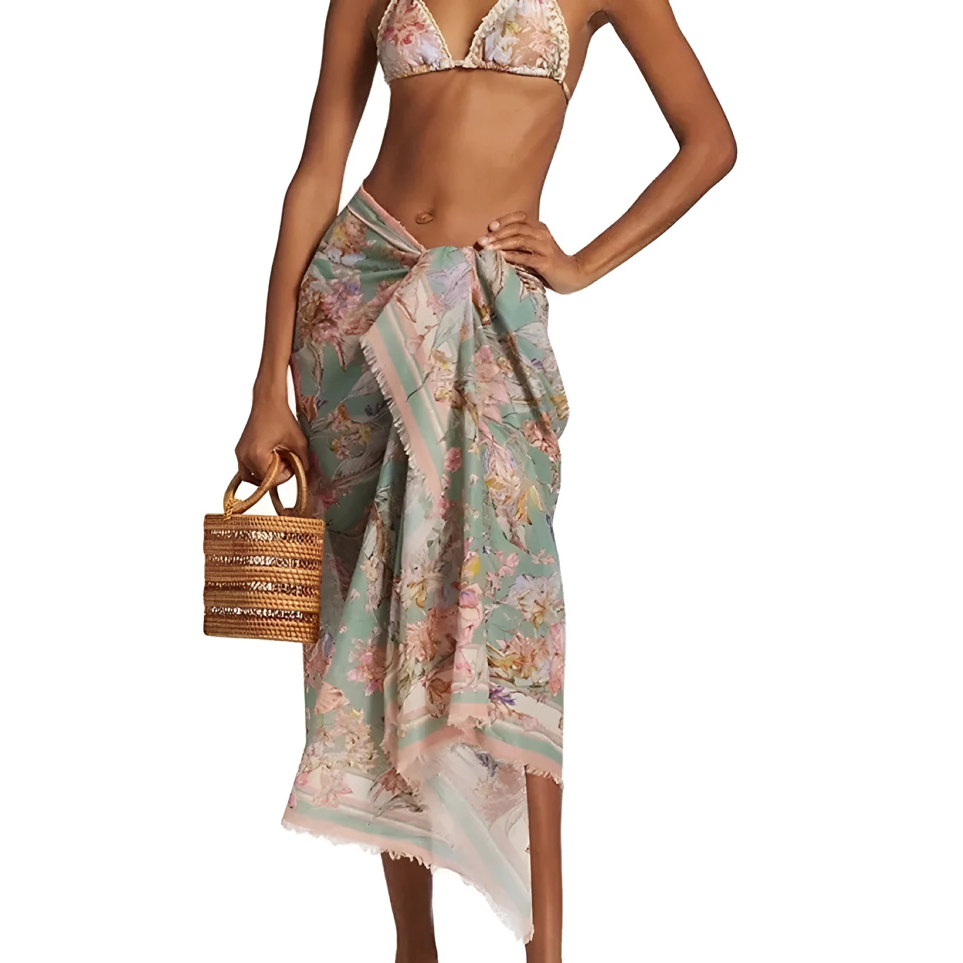 Women's creamy white floral bikini set with halter top, briefs, and a detachable ruffled skirt.
