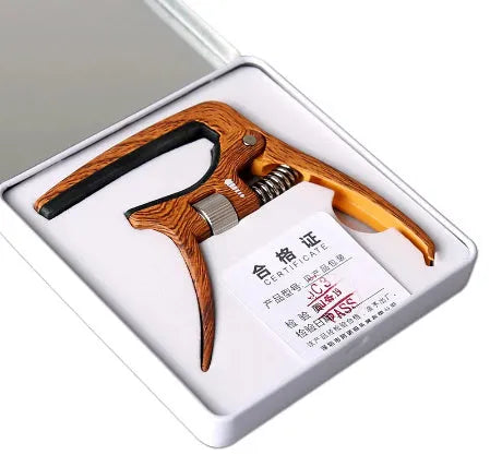 Aroma Capo AC-30 guitar capo in silver or wood grain colour, zinc alloy and silicone, with tuning clip