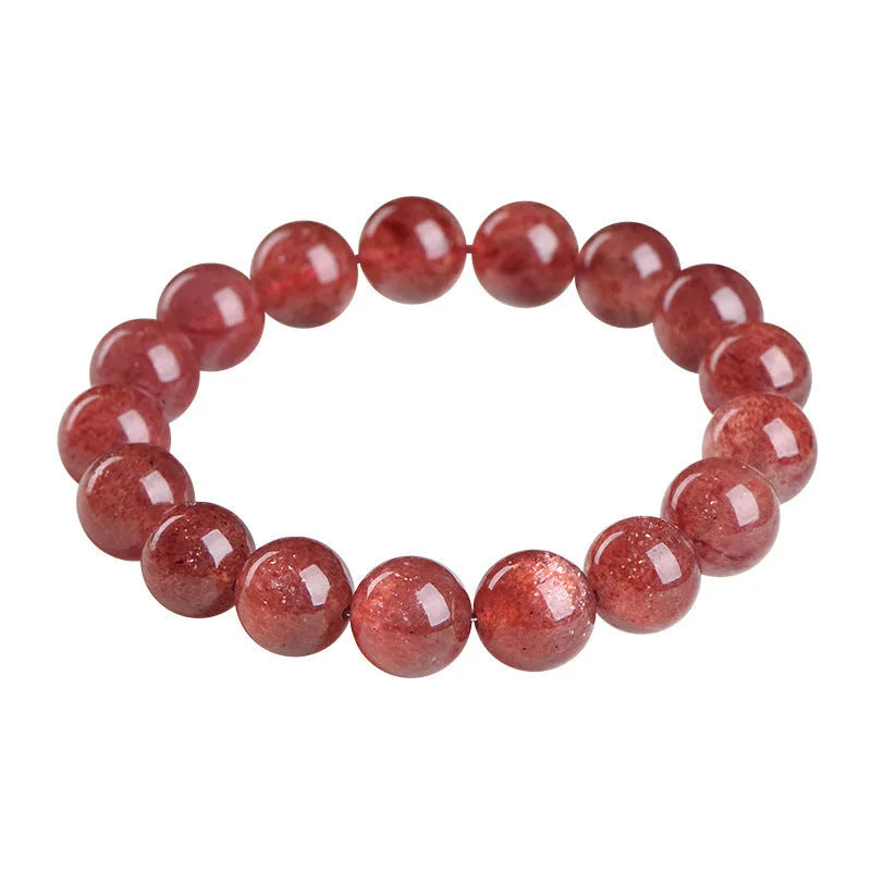 Natural strawberry quartz bracelet showing cherry red colour with starlight effects on geometric beads