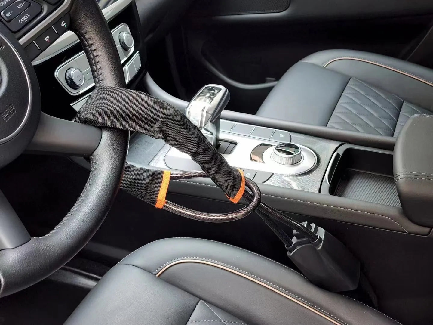 Iron wire rope steering wheel lock for General Motors cars with copper lock core in choice of colours