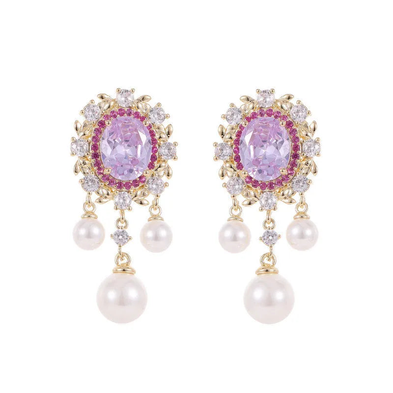 Oval geometric earrings with zircon inlay, pearl details, and tassel design in light purple colour