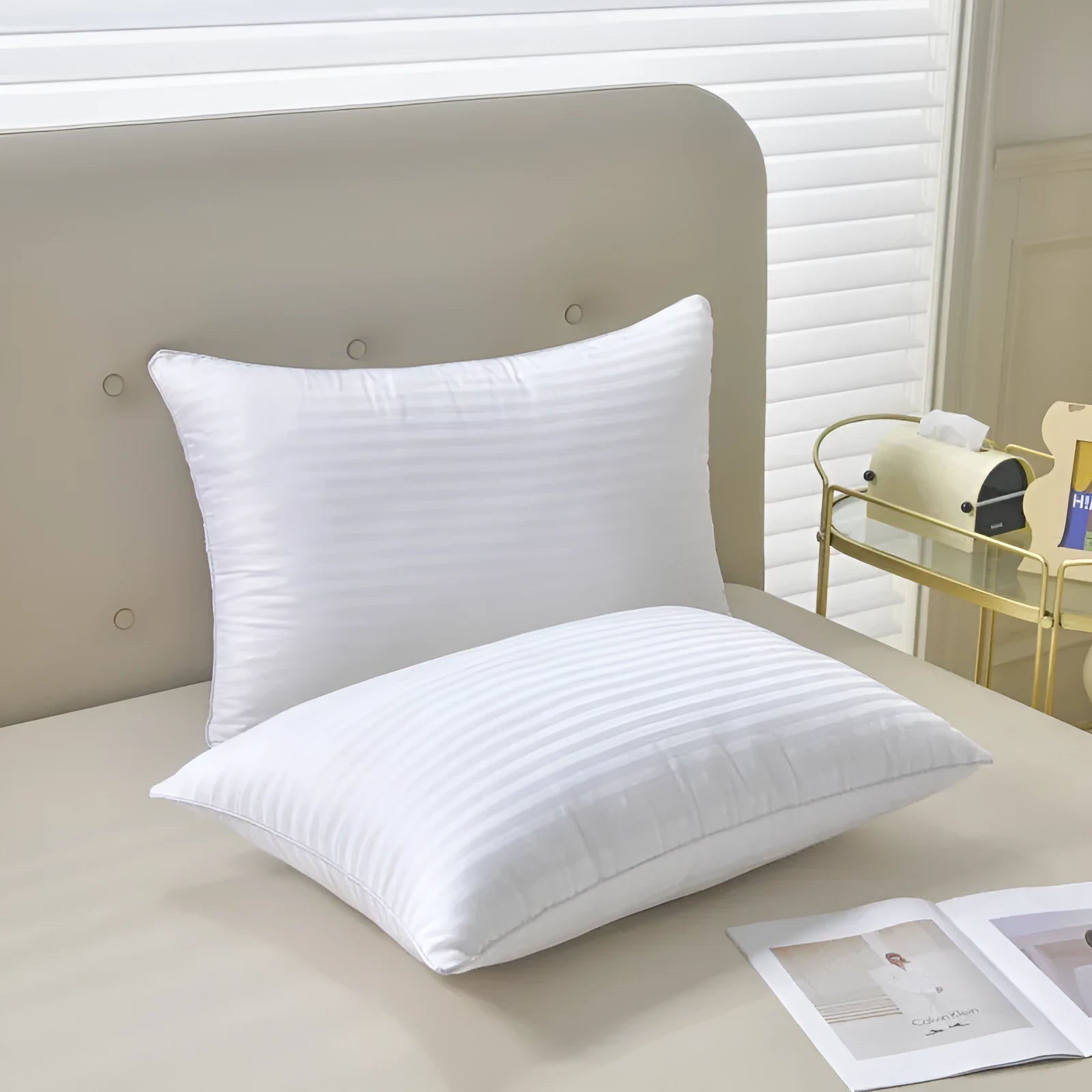 White cotton satin stripe pillow with feather cotton filler, shown in low, medium, and high loft options.