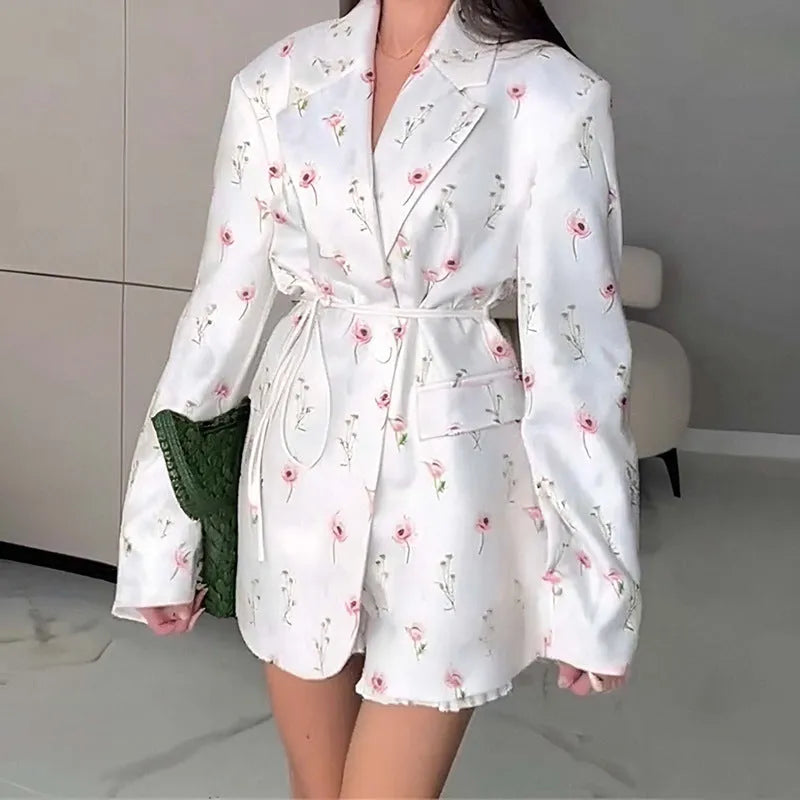 Women's white polyester suit jacket with a lace-up detail cinching the waist.