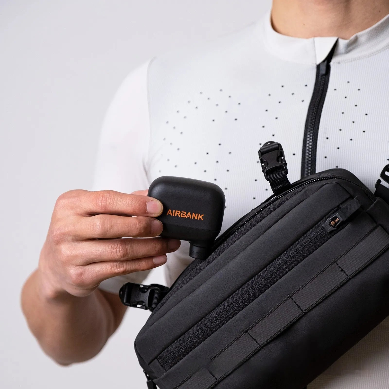 Black AS100 electric bicycle tyre pump with USB charging cable and waterproof storage bag