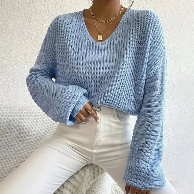 Women's solid colour long sleeve polyester pullover casual top shown in available colours.