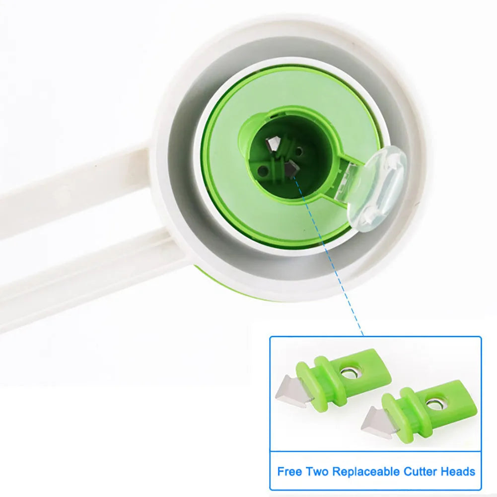 Green or orange plastic round paper cutter for A3 paper on a colour box.