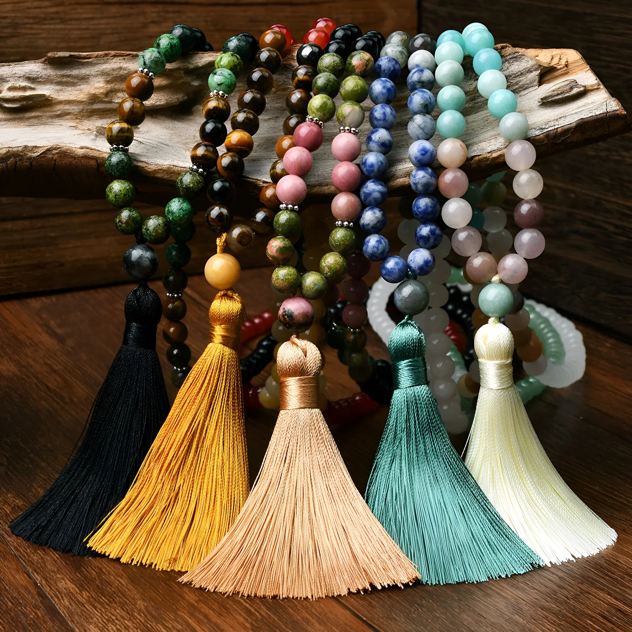 Long beaded bohemian necklace with 108 natural stones, a geometric pendant, and colourful tassels on an 81cm chain.