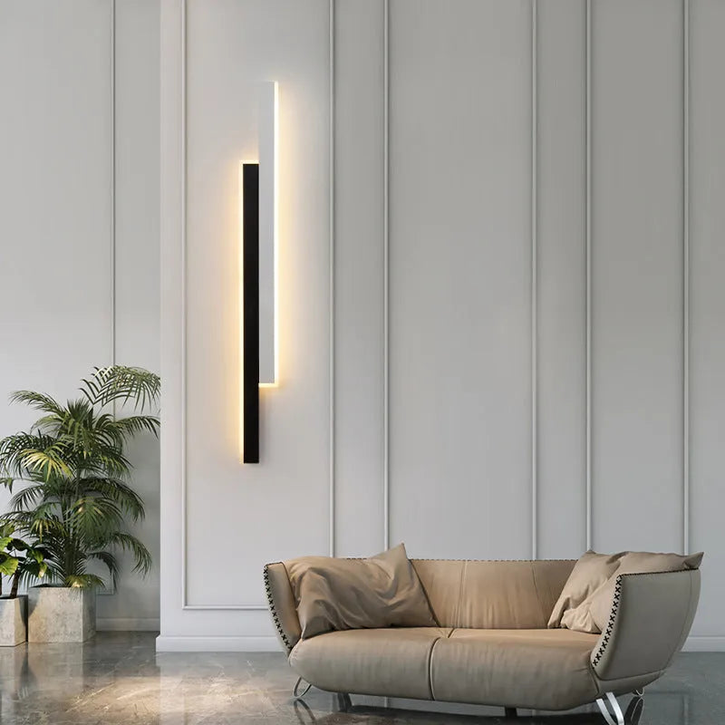 Black and white grid-free strip wall lamp with acrylic shade and three-colour LED lighting
